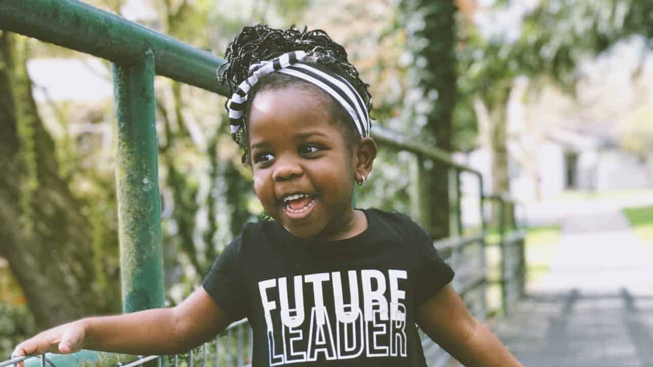 Girl with text Future Leader on T-shirt